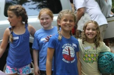 Group of campers standing together outdoors at Athens YMCA Camps